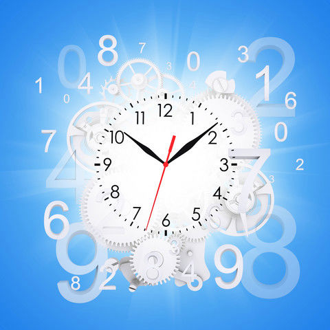 Ur med blå baggrund. Der flyver en masse tal rundt omkring uret.